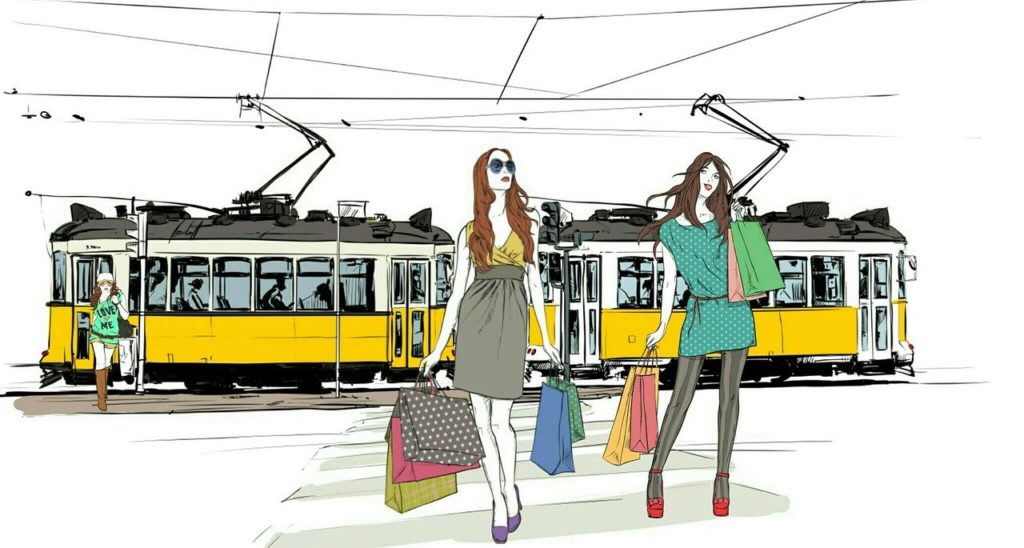 ショッピングバッグを持つ女性たちと路面電車